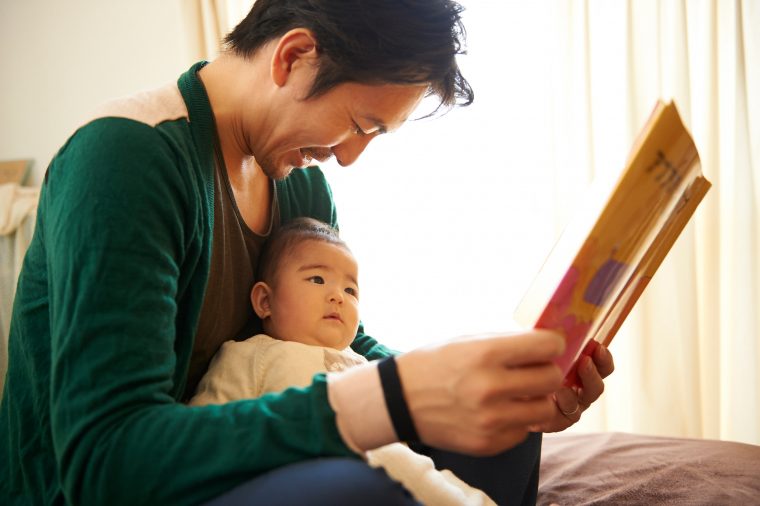 A father reading to his child