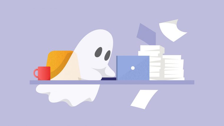 A ghost typing on a laptop