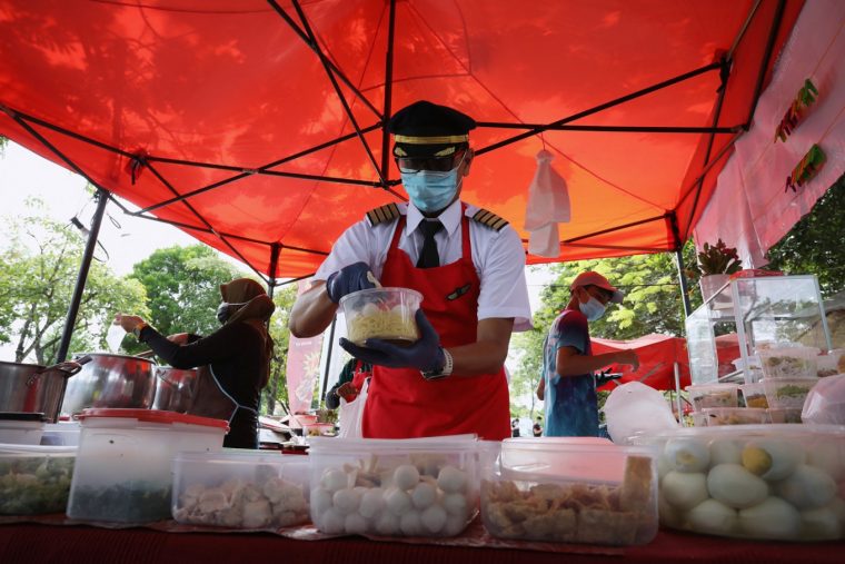 Pic of Malaysian Pilot serving food