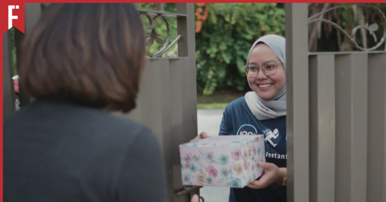 A girl sending a package to someone