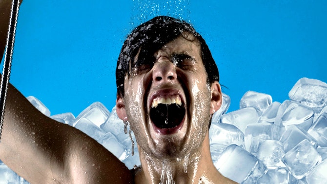 man taking an ice cold shower