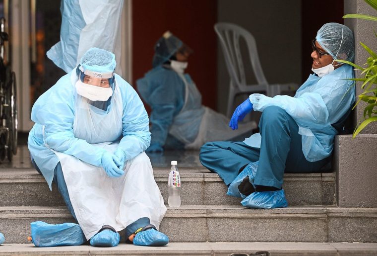 Several Malaysian doctors taking a break after a long shift