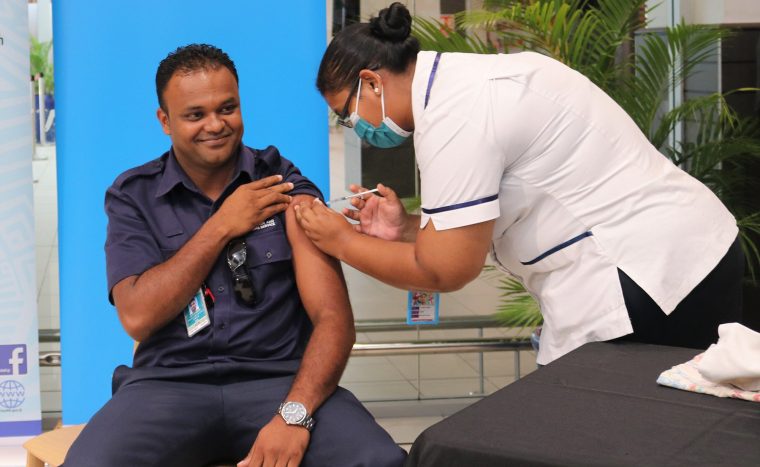 man getting vaccinated