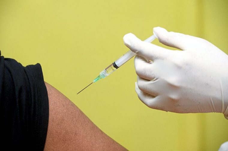 Malaysian getting vaccinated