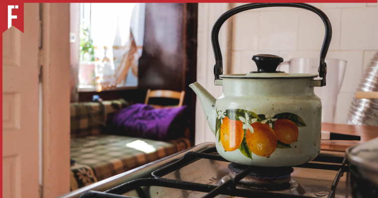 kettle full of hot water boiling on a stove