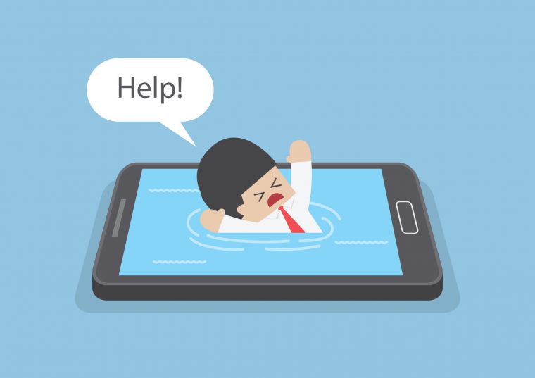 A man drowning in his phone