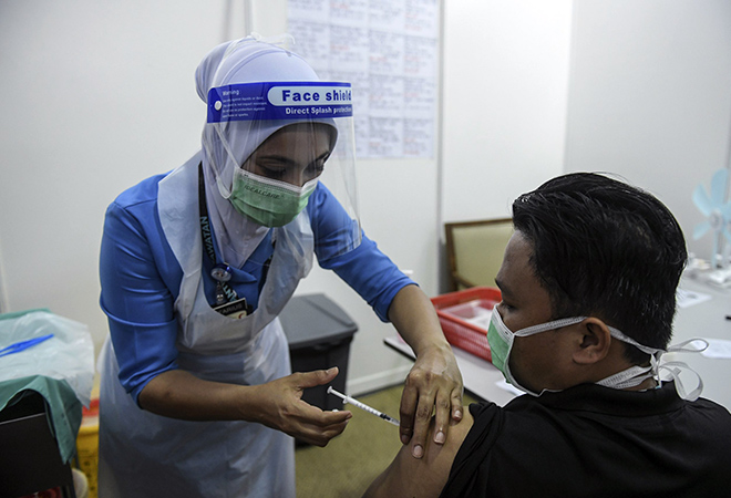 man getting vaccinated