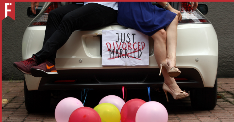 divorce couple sitting on a car