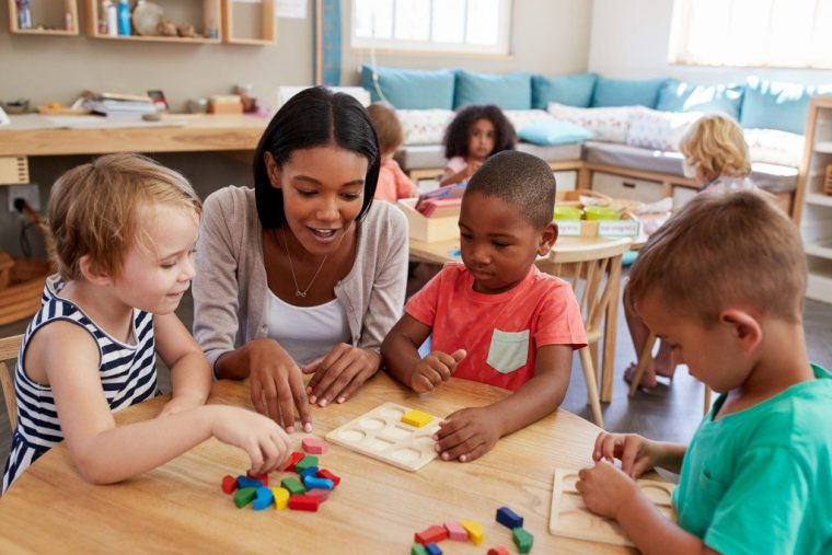 Teacher teaching students