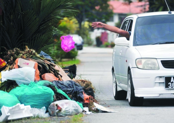 throwing trash out your car