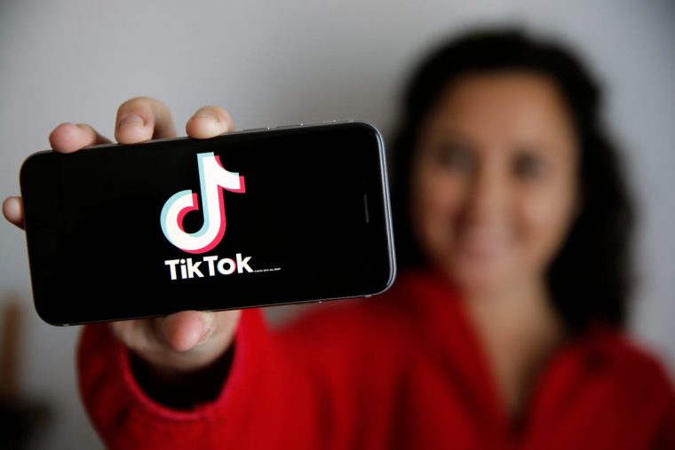a girl showing tiktok on her phone