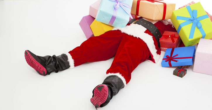 Santa covered in presents
