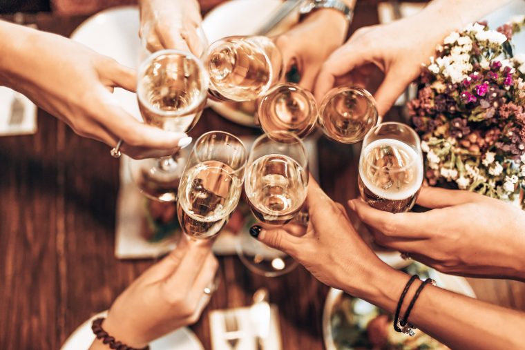 Girls cheering with champagne